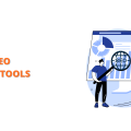 A digital banner advertises "Top 9 Options" for the "Best SEO Audit Tools for 2024." An illustration shows a person using a large magnifying glass with "SEO" on it to examine a webpage displayed on a computer monitor, which features charts and graphs, visually representing the process of an "SEO Audit" using "SEO Audit Tools."